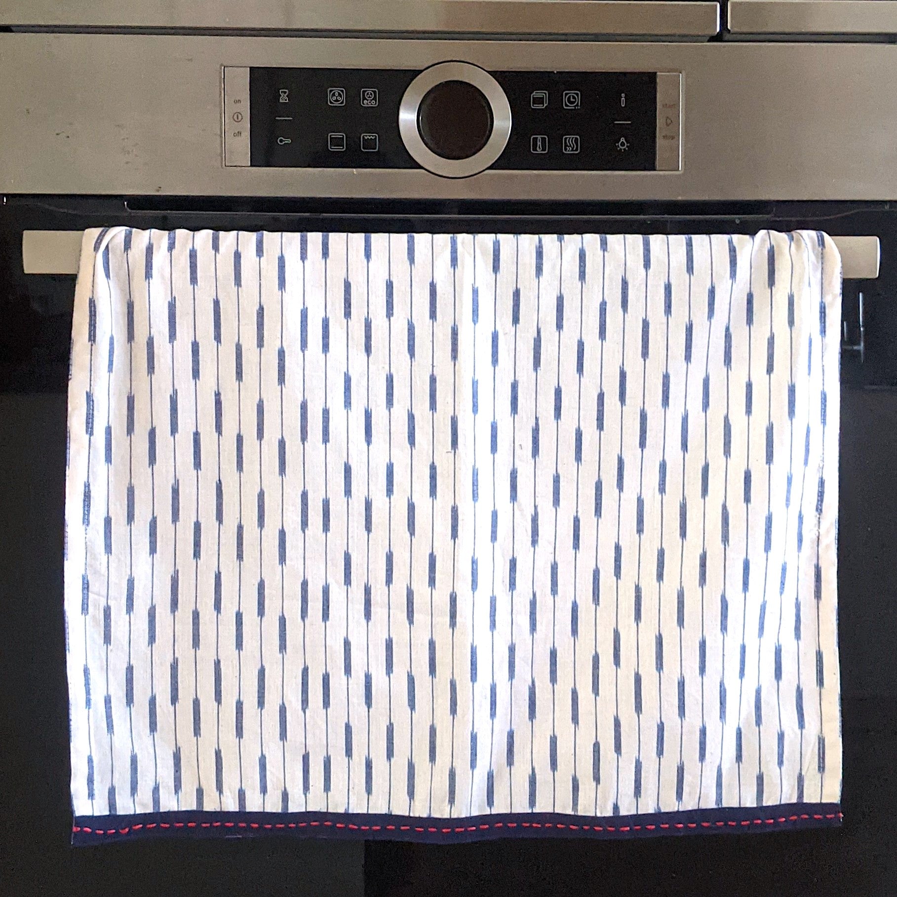 Extra Large Tea Towels in Woven Ikat Cotton with an Embroidered Trim
