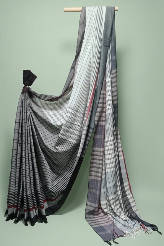 Striped sari draped over a white background