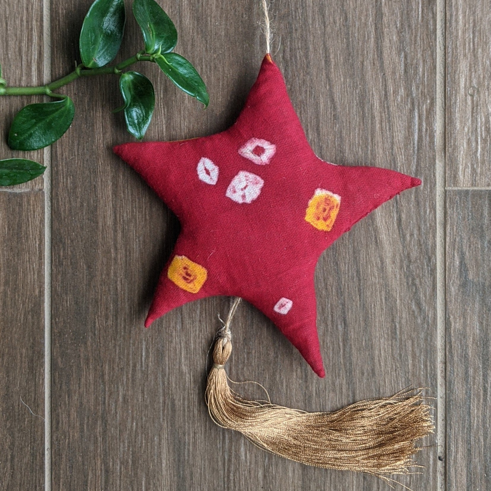 3 Stuffed Fabric Stars in 3 Colors hang together, filled only with organic materials